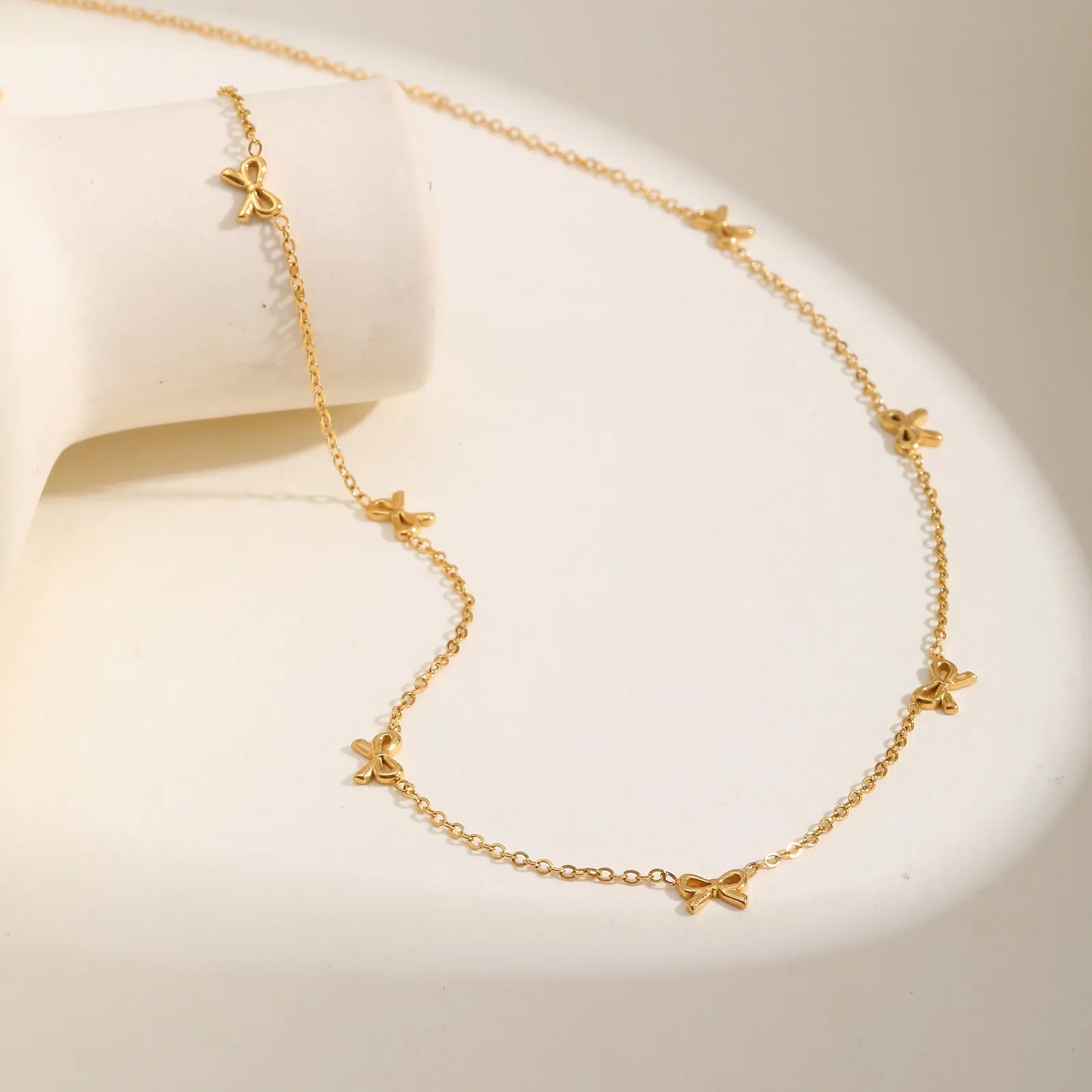 Collier nœud de papillon charms pour femmes