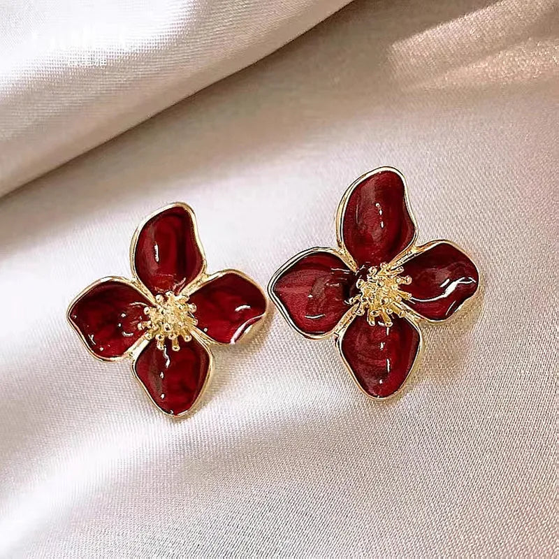 Boucles d’oreilles en hibiscus en acier inoxydable en forme de clous